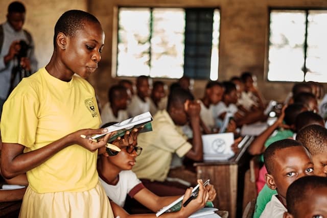 student standing in classroom